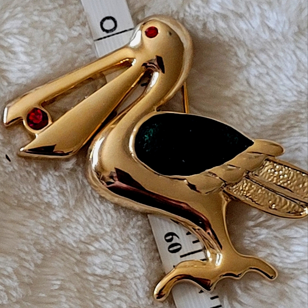 Gold toned Pelican Brooch